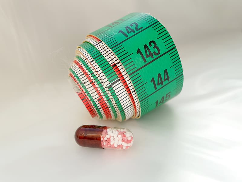 green-and-black-tape-measure.jpg