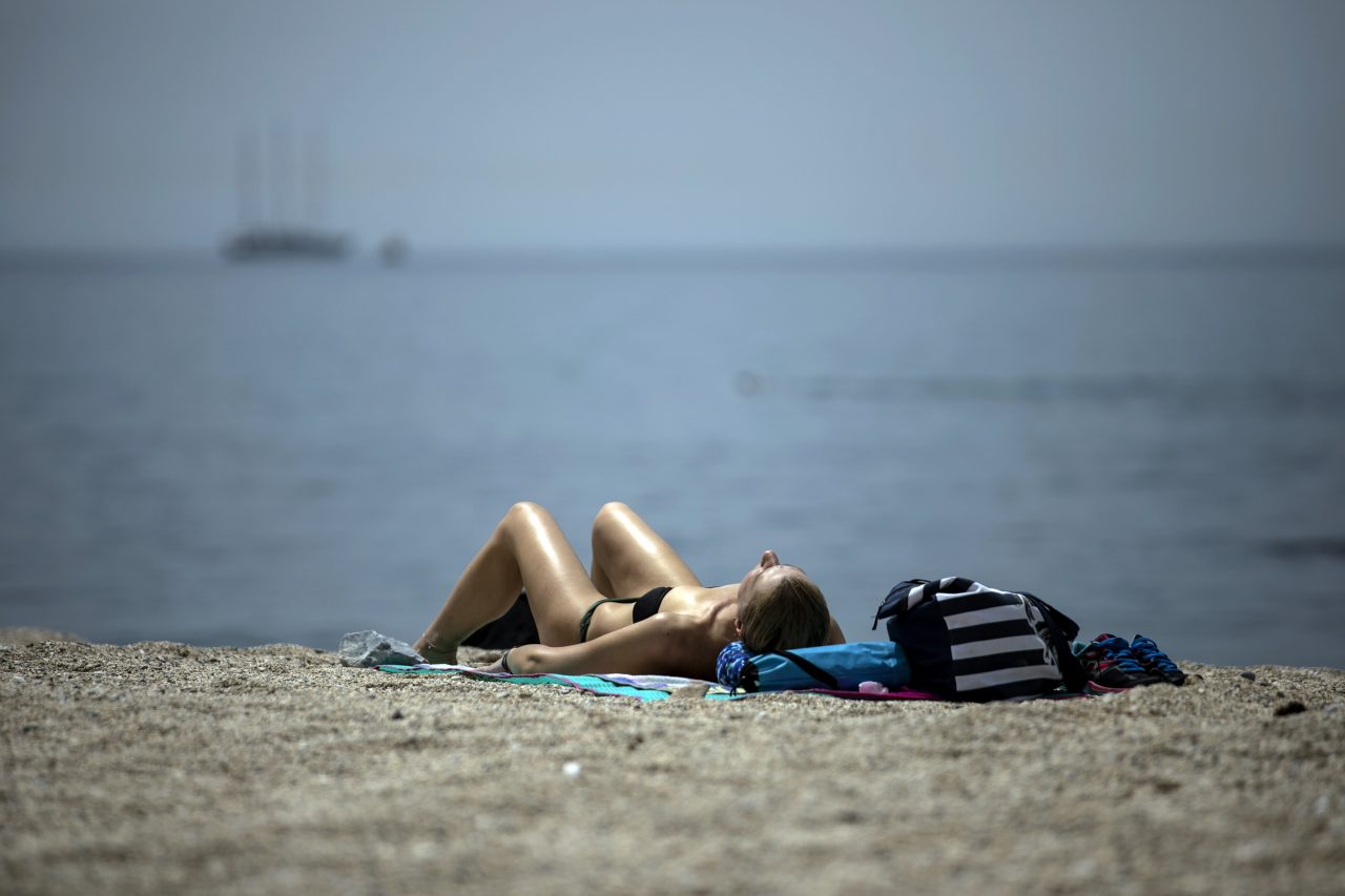 Virus Outbreak Greece Beaches